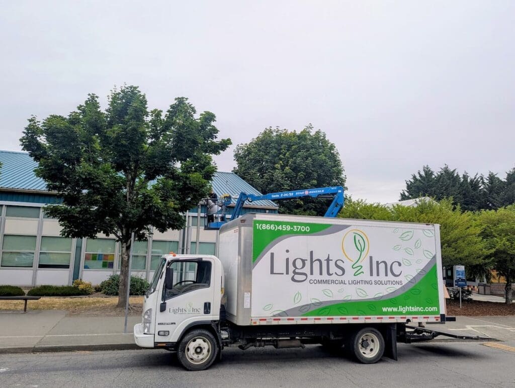 lights inc truck parked in a parking lot